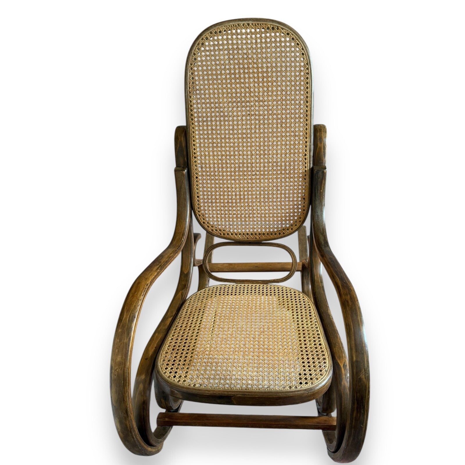 Early 20th century bentwood and cane rocking chair – front view showing scroll frame and seat