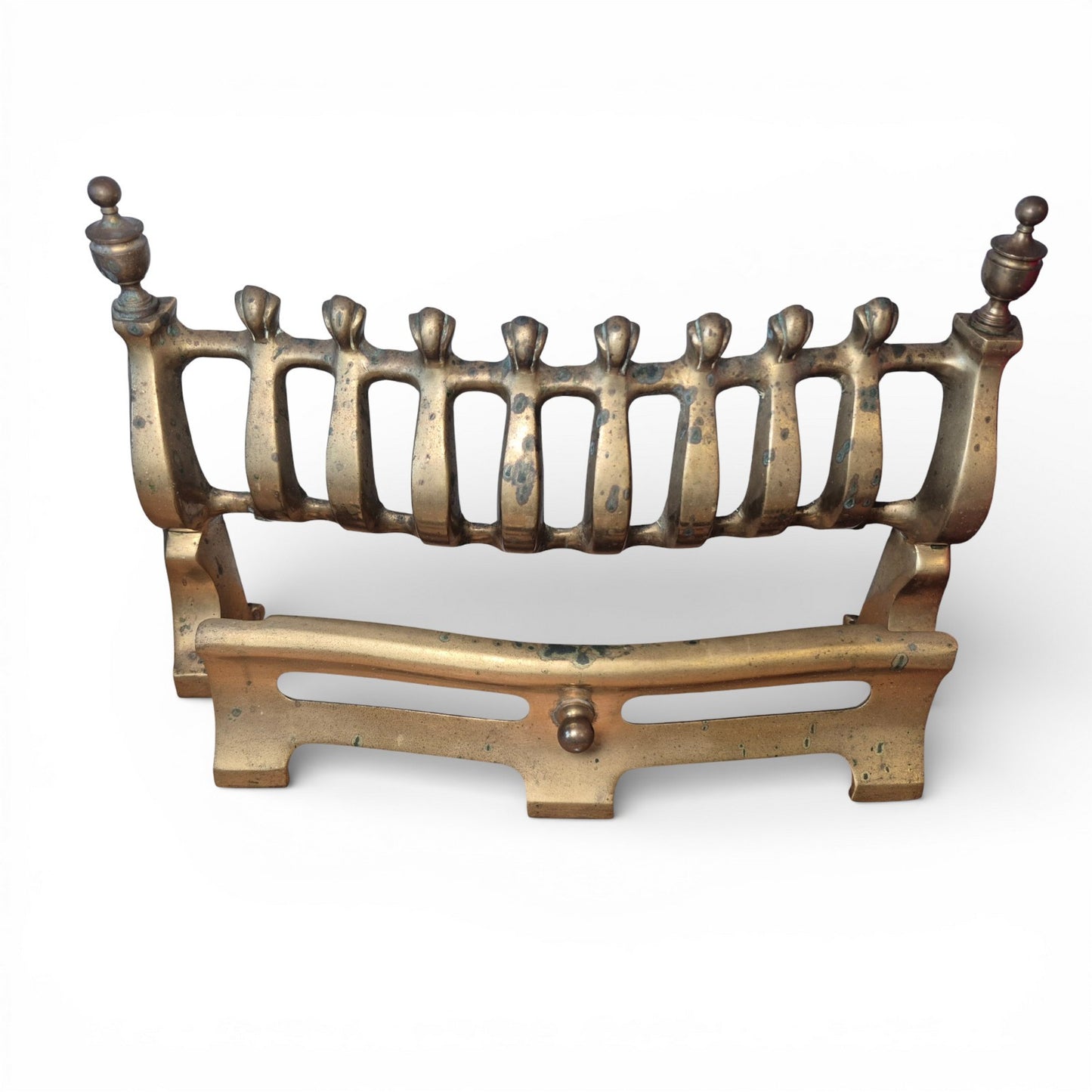 Late Victorian brass fire grate with finial uprights