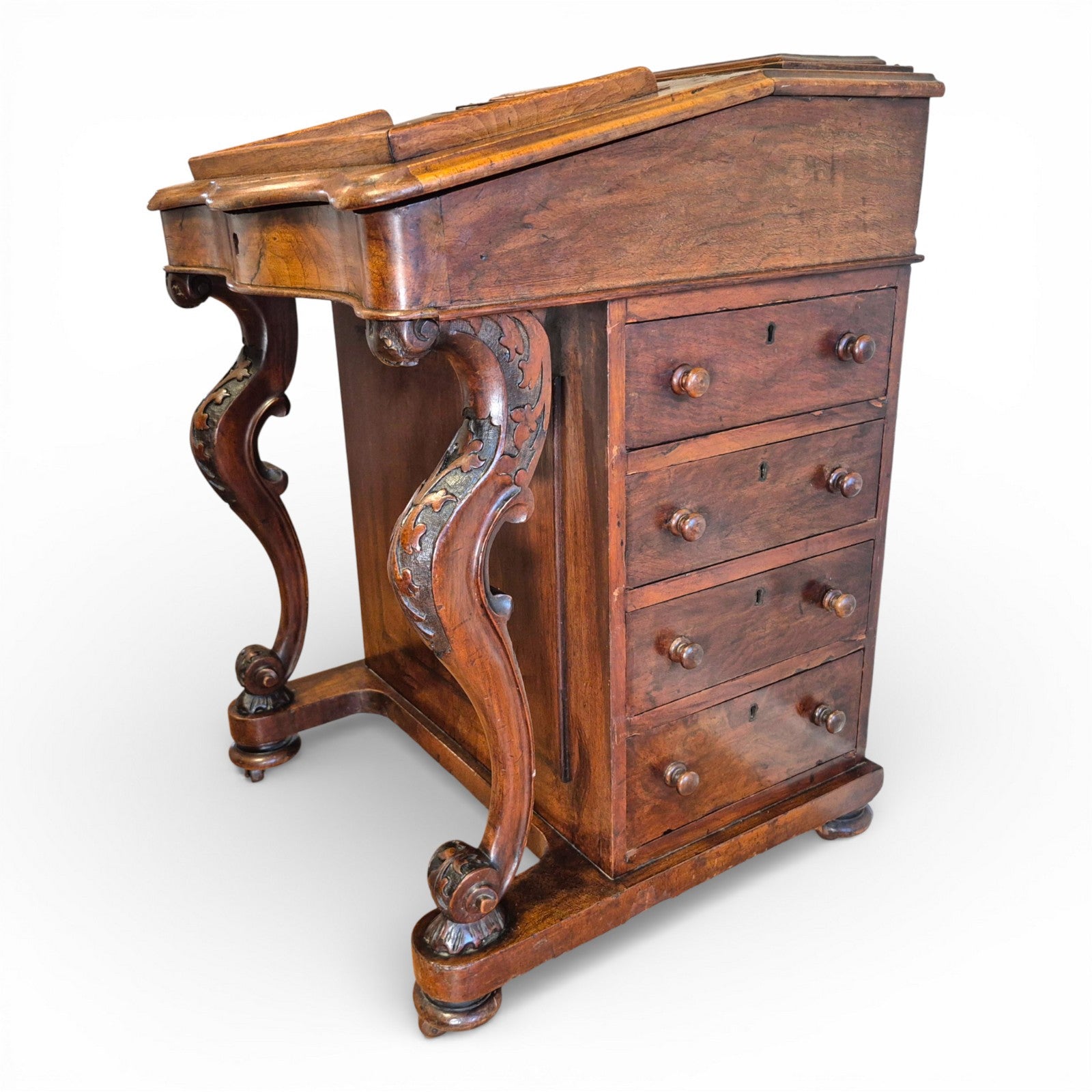 Victorian burr walnut davenport desk showing carved cabriole legs