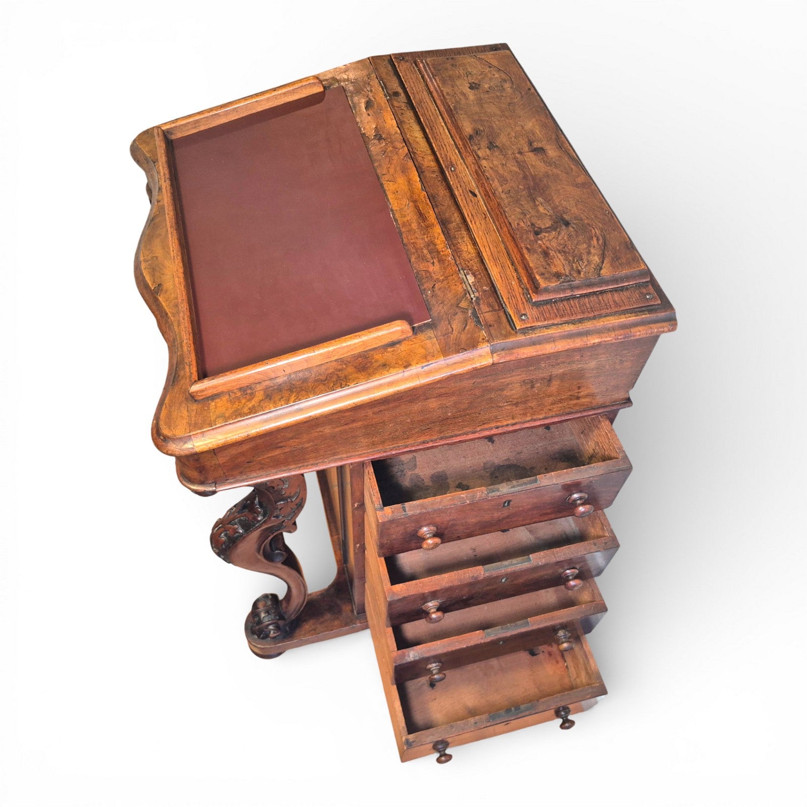Open side drawer detail on antique Victorian burr walnut davenport desk