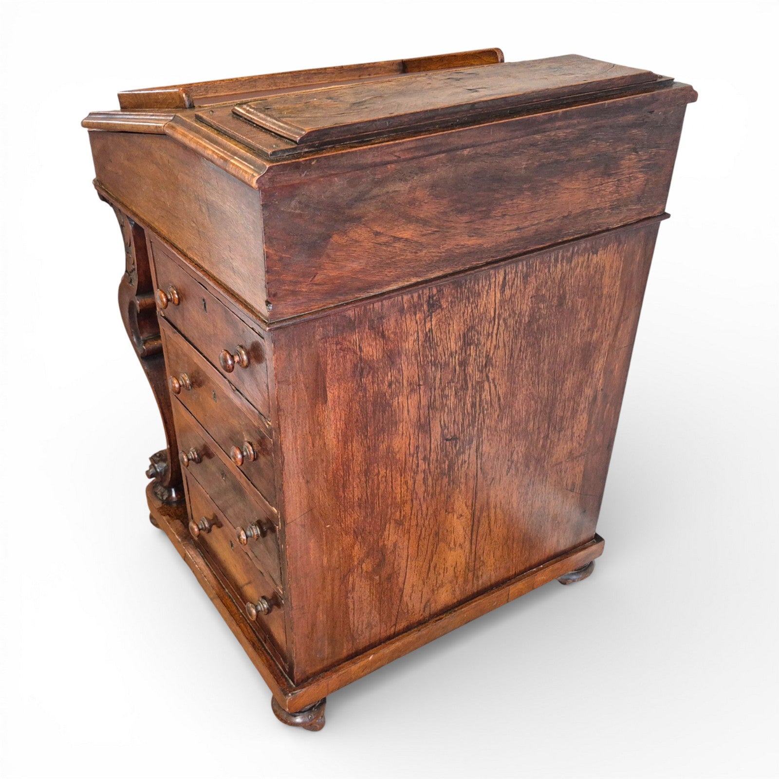 Rear profile of antique Victorian burr walnut davenport writing desk