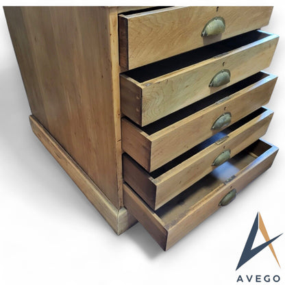 Close-up of brass pull handles and dovetail joints on Victorian collectors chest