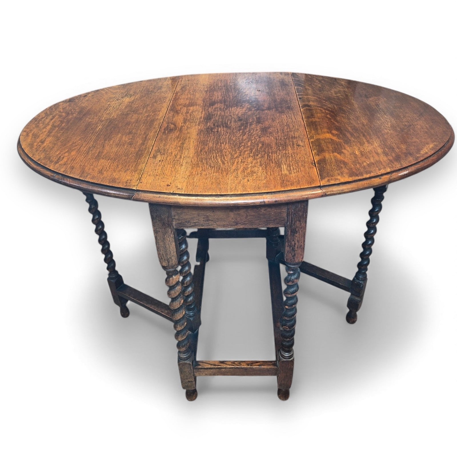Antique Victorian oval gate-leg drop-leaf table with barley twist supports