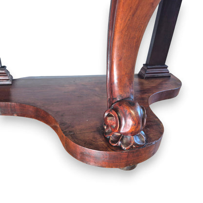 Carved mahogany Victorian washstand, scroll support and acanthus-style foot.