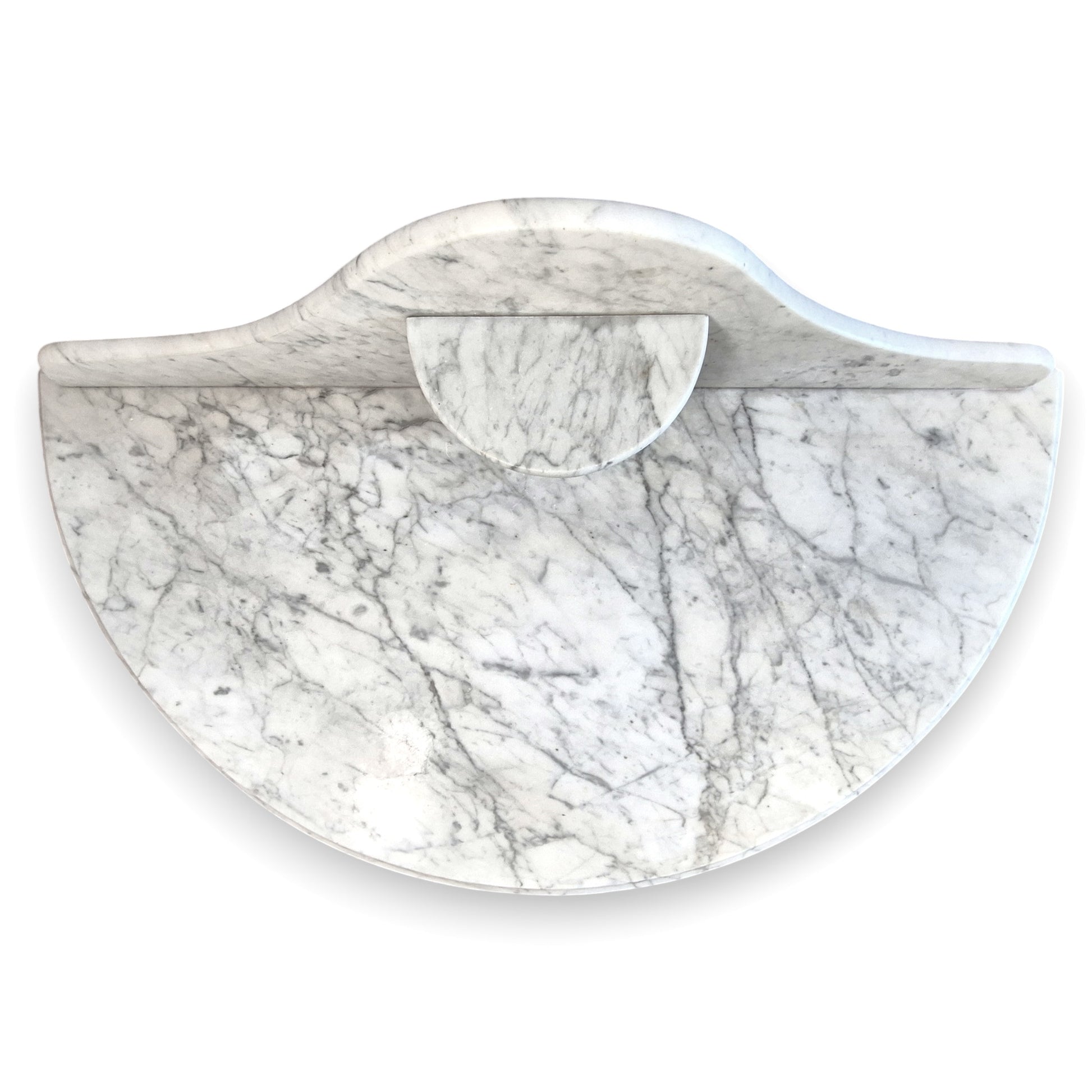 Top view of the veined marble top and shaped backstand on an antique Victorian washstand.