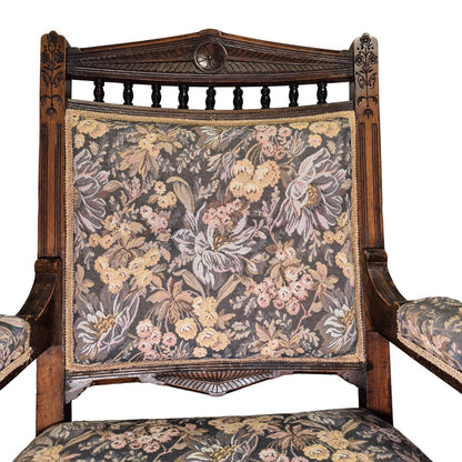 Close-up of carved crest rail on Victorian oak nursing chair