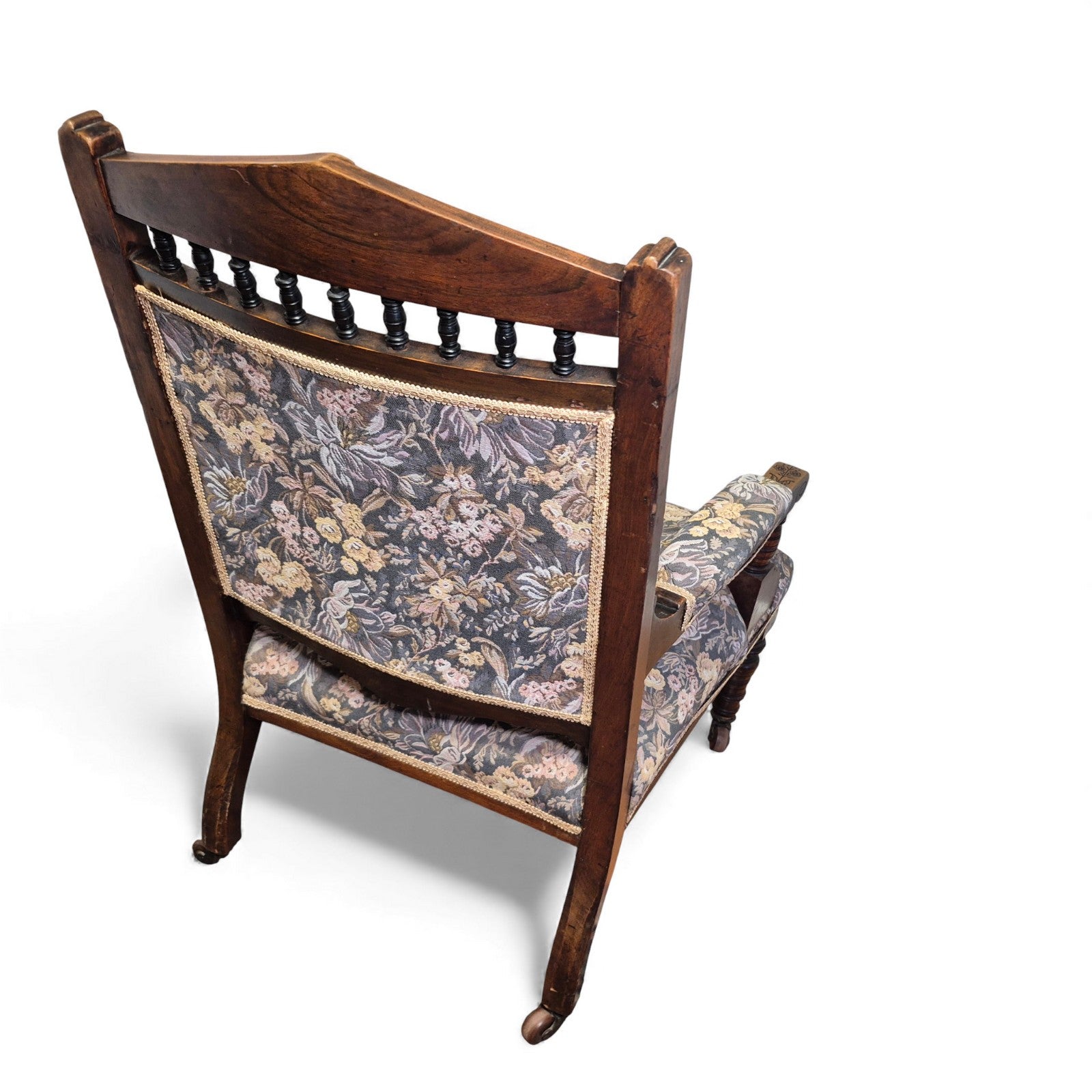 2nd Back view of carved oak nursing chair with spindle gallery