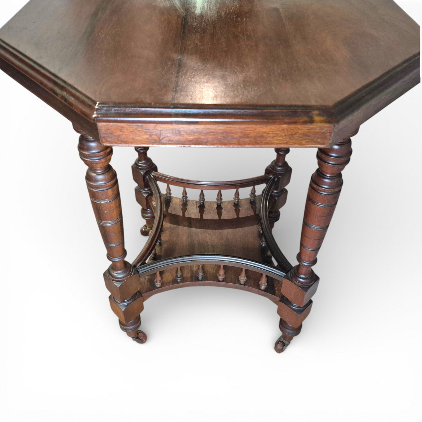 Antique walnut side table with turned legs and warm polished finish