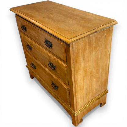 Side view of antique Victorian pine bedroom chest of drawers