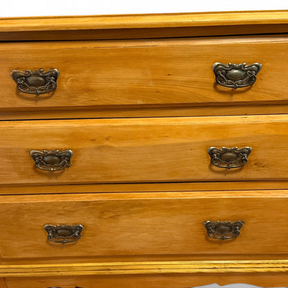 Detail of Victorian pine chest drawer fronts and handles