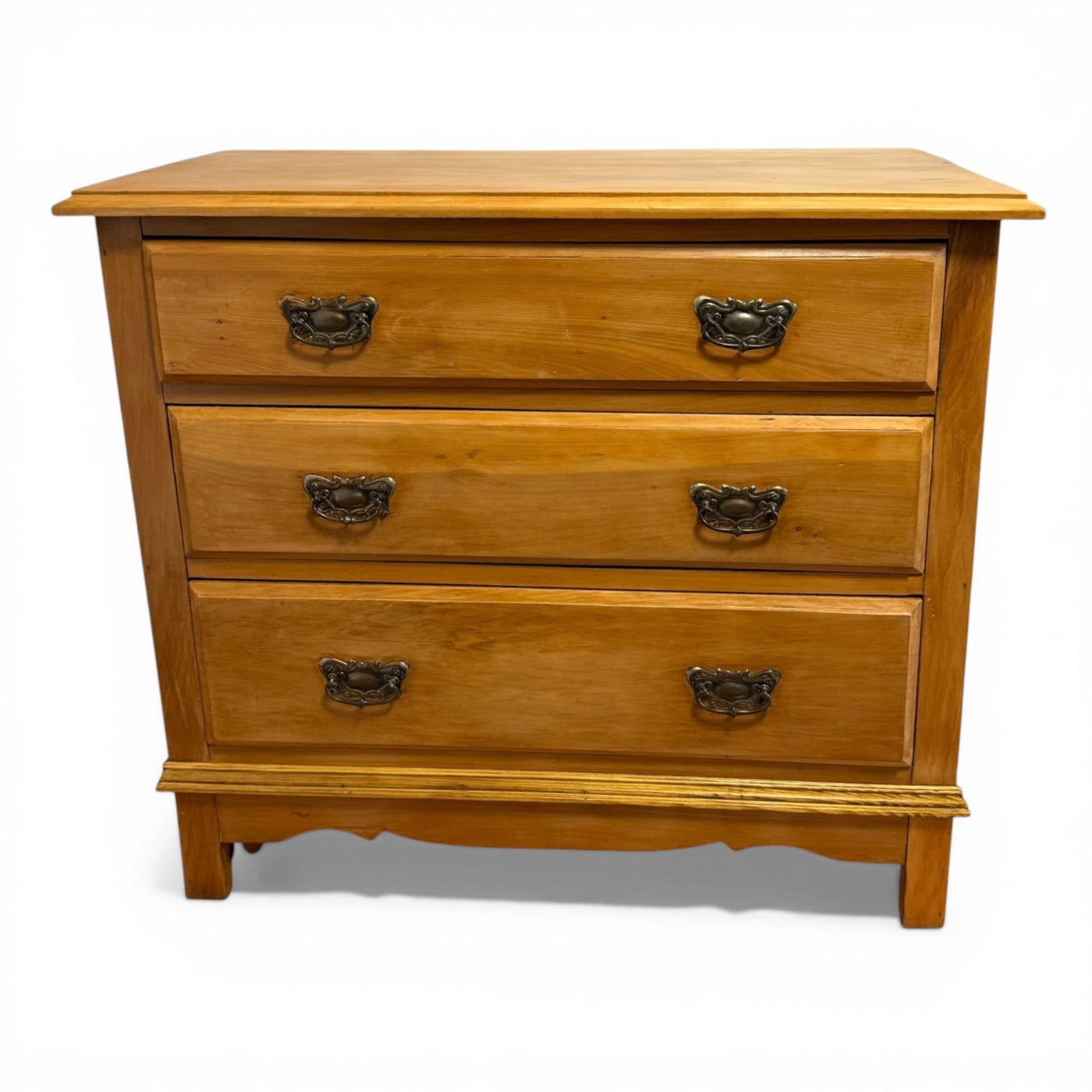 Front view of Victorian pine chest of drawers with three storage drawers