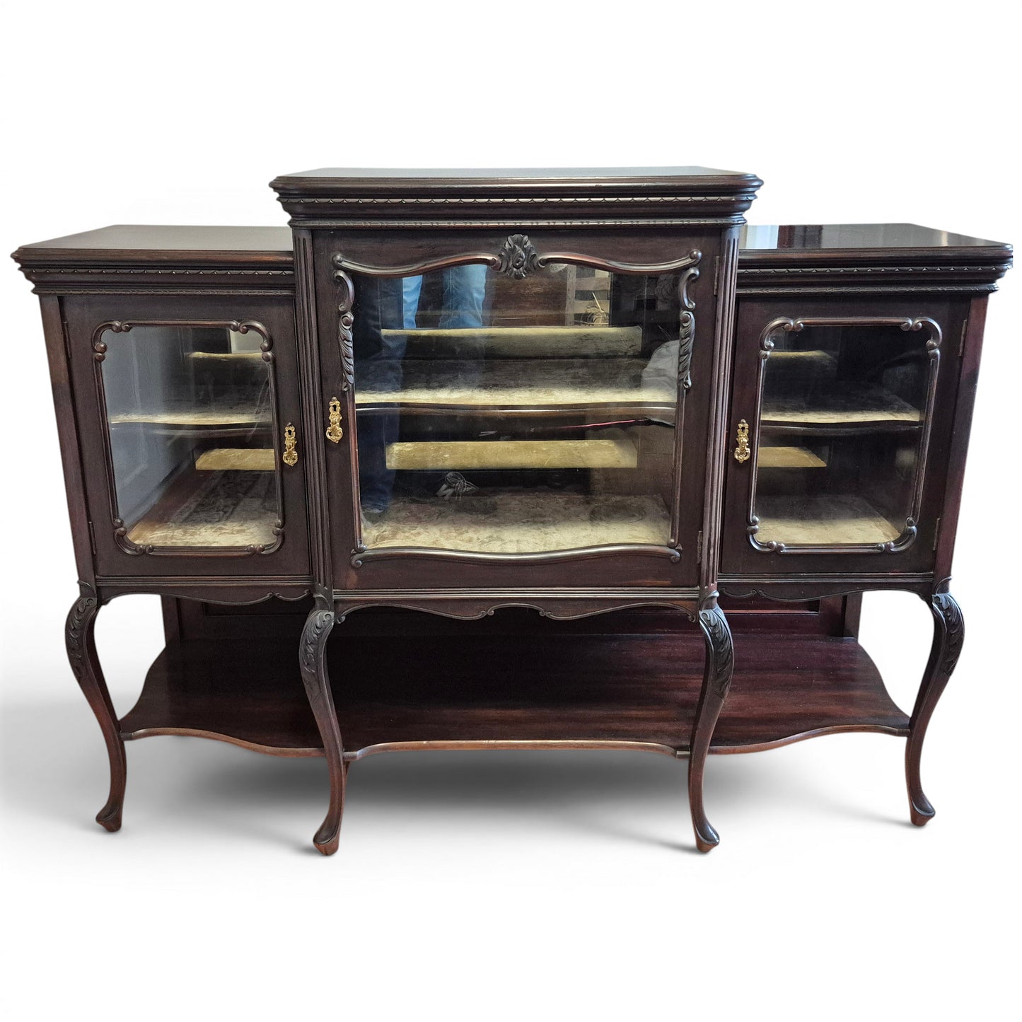 Victorian mirror-backed display cabinet with glazed doors and carved mahogany frame