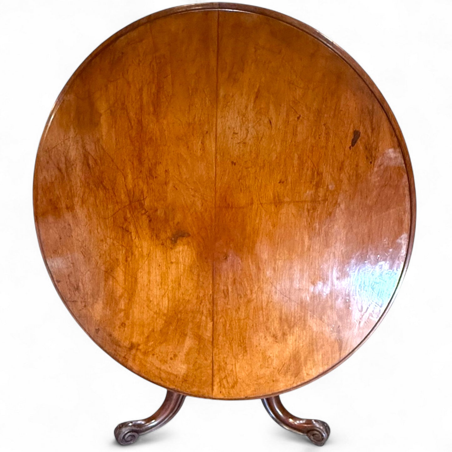 Victorian mahogany tilt-top table shown upright for storage – antique breakfast table design