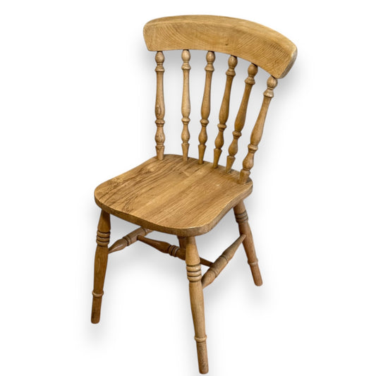 Victorian farmhouse chair – angled view highlighting turned legs and rustic design