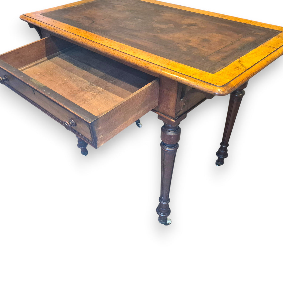 Antique Victorian walnut writing table with full-width drawer open