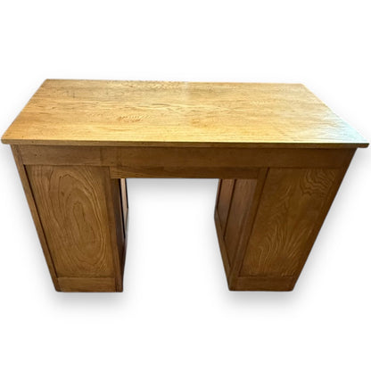 Rear Kneehole and pedestal detail of vintage oak Art Deco writing table – seven drawer design