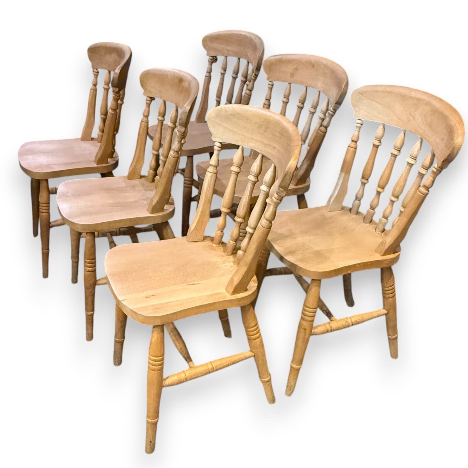 Beech farmhouse kitchen chairs – angled view highlighting curved top rails and natural tone