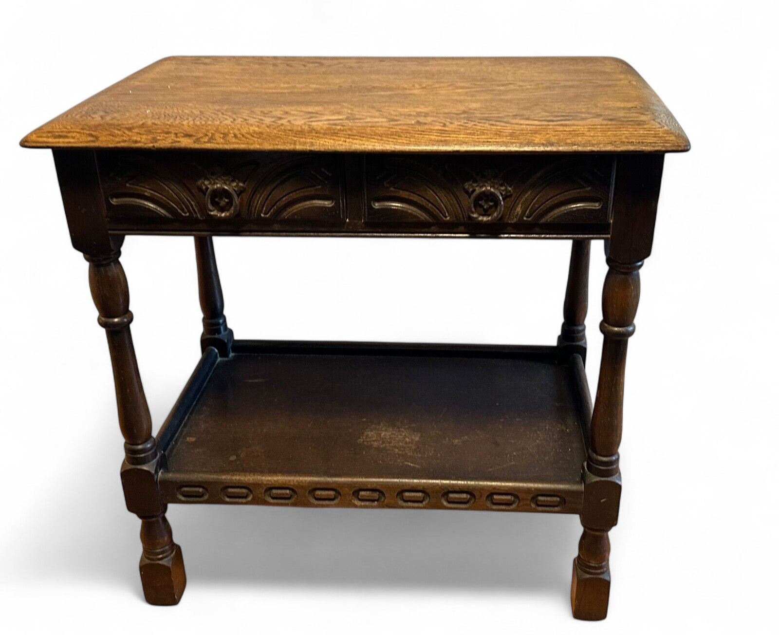 Vintage elm side table with carved detail and lower shelf