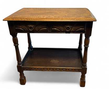 Vintage elm side table with carved detail and lower shelf