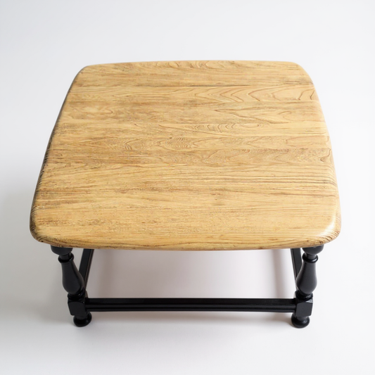 Vintage Ercol elm coffee table with restored top and painted satinwood base