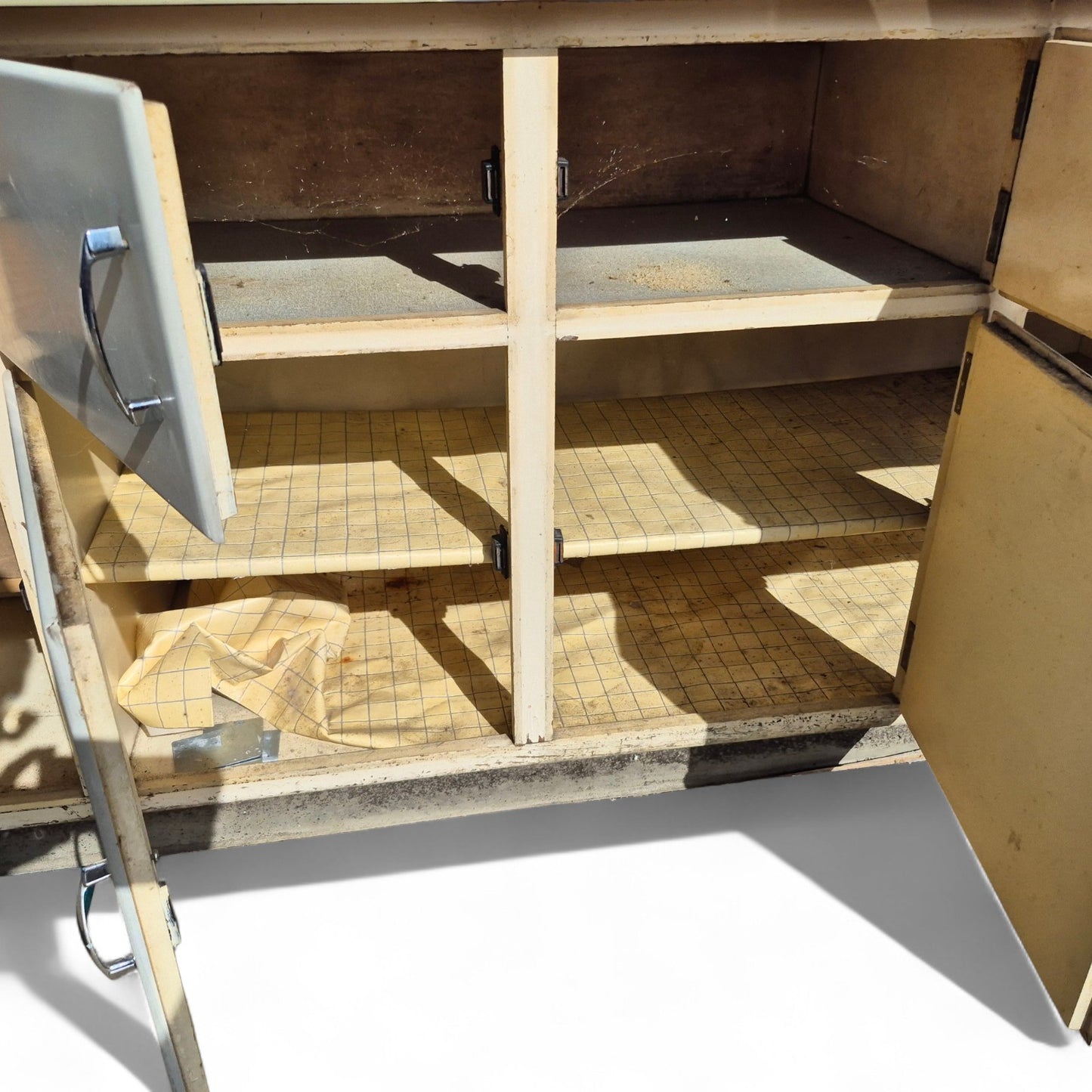 Retro kitchen cabinet – open doors revealing lower internal storage space