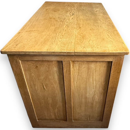 Left side view of Art Deco oak desk showing smooth patina – early 20th century design