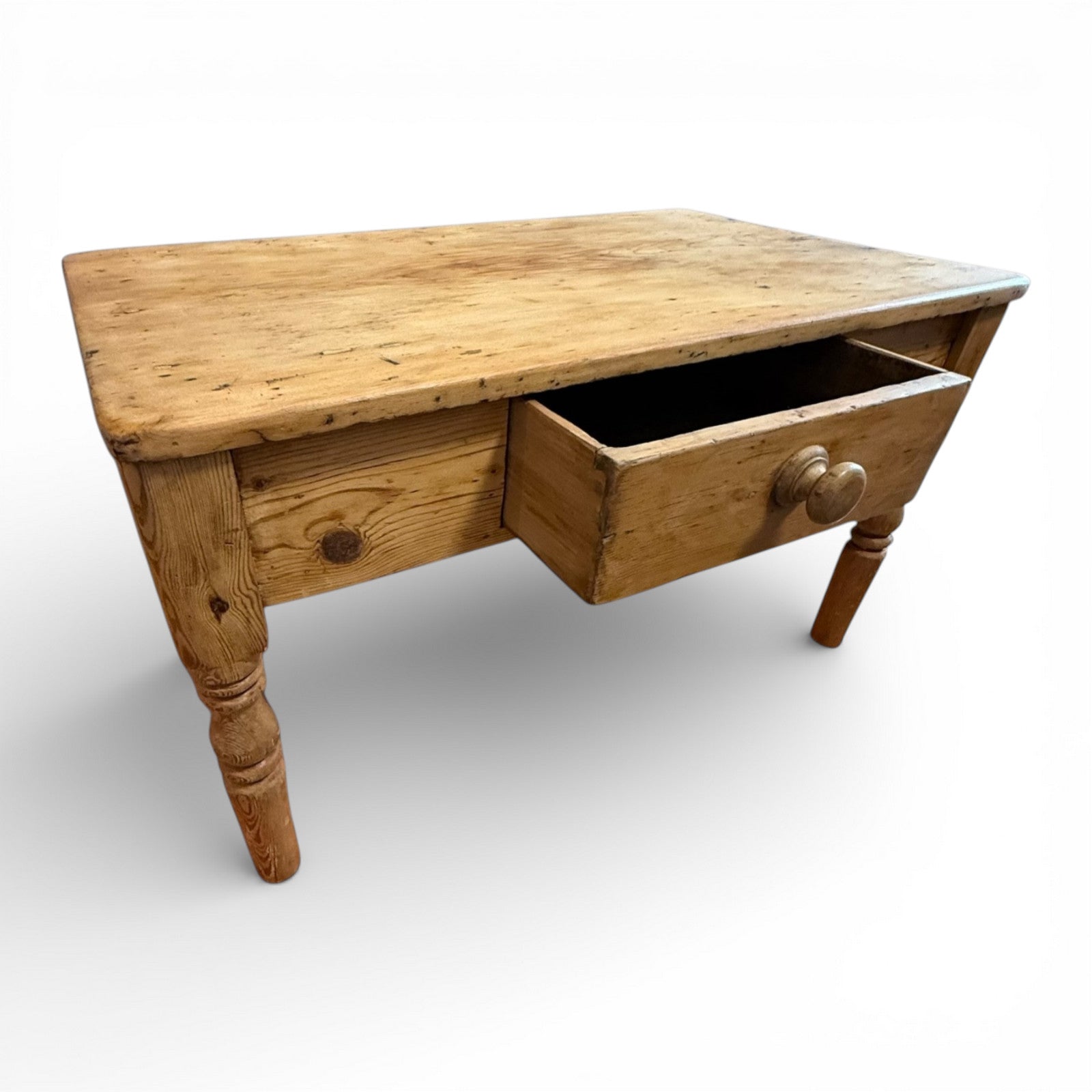 Solid pine centre table with vintage rustic styling and useful drawer