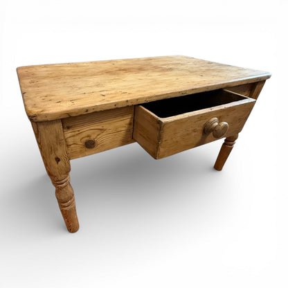 Solid pine centre table with vintage rustic styling and useful drawer
