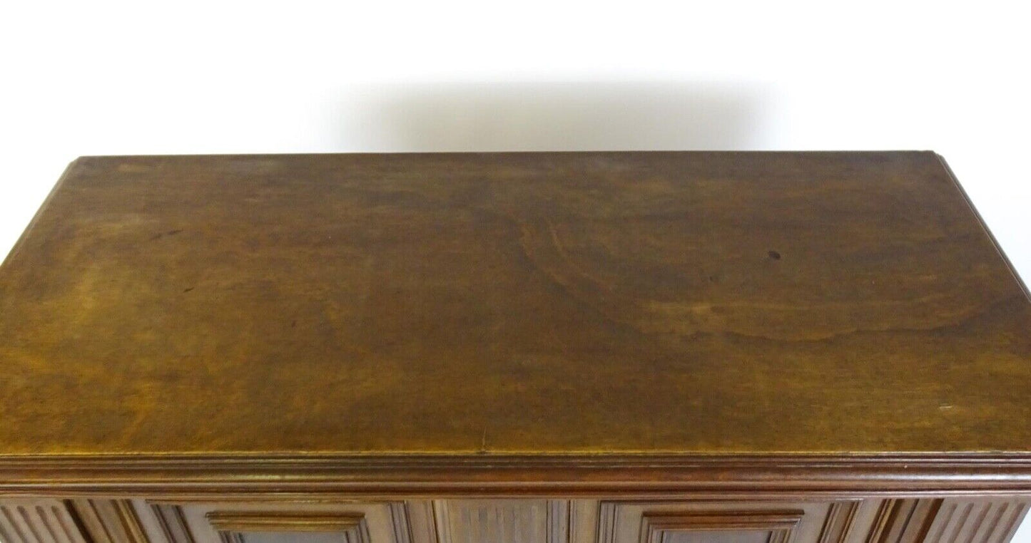 Top surface of antique walnut Victorian cupboard