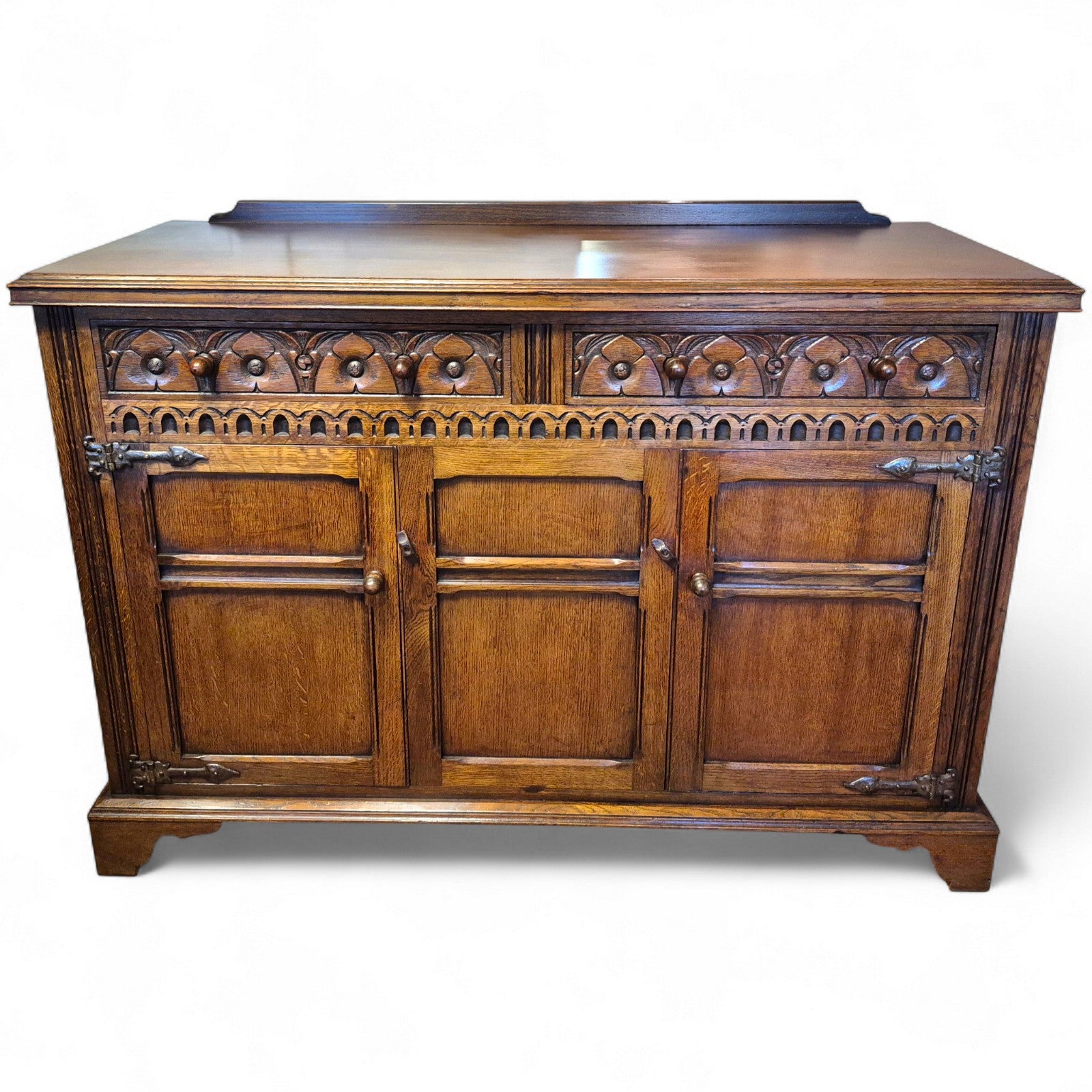 Tudor style oak sideboard with drawers and cupboards